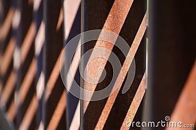 Abstract â€“ Diagonal Shadow Pattern on Rusty Bridge Stock Photo